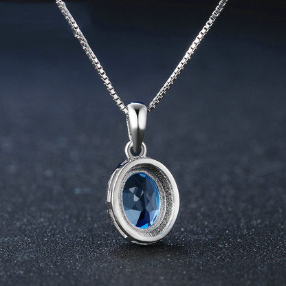 Blue Topaz Halo Necklace